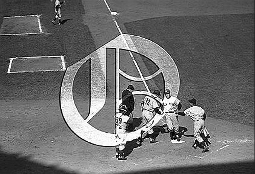 Elston Howard greeted at plate at Ebbets Field56N0283